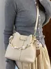 Bolso cubo muy elegante, nuevo bolso cruzado de moda otoño 2026, cadena de nicho sensación relajada bolso de mano de color liso