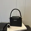 Bolso Versátil para Mujer 2026 Estilo Nuevo Elegante Gran Capacidad Cruzado al Hombro Pequeño Tipo Cubo Bolso con Sensación Casual