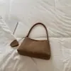 Bolsa de ombro estilo baguette retrô coreana, cor sólida, textura tecida, para usar sob o braço, modelo novo 2026, bolsa de ombro casual e única para o dia a dia