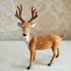 Animal de simulación ciervo sika simulación alce jirafa modelo animal de piel accesorios de decoración para cine y televisión venta al por mayor