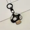 Chaveiro criativo em formato de cogumelo, transfronteiriço, leve e luxuoso, com adornos de diamante, material de PU moderno, charmoso de bolsa requintado estilo coreano e japonês, e um acessório fofo para meninas