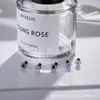 Jiangtai F136 Joyería de Aleación de Titanio Aretes de Mariquita con Circonita, Joyería para Piercing Corporal de Aleación de Titanio de Venta Caliente Transfronteriza Tornillos para Oreja