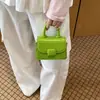 Moda Transfronteriza Bolso de Mujer Primavera y Verano Nuevo Nicho Viajero de Negocios Portátil Mini Bolso para Labial Cruzado Bolso Infantil