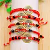Pulsera de Cuerda Roja Tejida a Mano Año del Zodíaco Venta al por Mayor Pulsera de Cobre Puro con Moneda de Cinco Emperadores Amuleto del Festival del Bote del Dragón