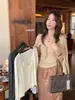 Conjunto de Dos Piezas Camisola de Costilla Suave Estilo Coreano Otoño Té Verde Limón + Cárdigan de Punto Versátil 99931
