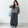 Elegante conjunto de suéter de punto de otoño para niñas, nuevo conjunto casual de dos piezas estilo coreano con pantalones a cuadros y top, 2026