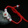 Pulsera de cuerda roja de jade pulsera cuerda tejida a mano puesto de venta al por mayor producto de Yiwu pequeño bienestar