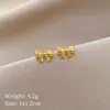 [acero de titanio de cuerpo completo] pendientes de estilo minimalista con patrón de lazo, pendientes fríos para hombres y mujeres, temperamento de personalidad, pendientes para banquete