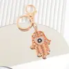 Llavero Corazón de Amor Creativo Ojo del Diablo Incrustado con Diamantes Colgante de Metal Encanto para Bolso Llavero Pequeño Regalo Exquisito