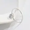 Anillo de acero de titanio con personalidad de moda de lujo ligero con circonita en forma de gota de agua y temperamento de diseño europeo y americano, no se decolora, venta al por mayor que combina con todo