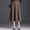 Falda Versátil de Color Sólido de Moda Estilo Coreano para Mujer Otoño 2026 Nueva Falda de Línea A de Cintura Alta Adelgazante con Caída de Longitud Media