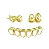 Auténtico Hiphop Transfronterizo Diente de Oro Grill Planeta Corazón Set de Tres Piezas Hip-Hop Accesorios Dentales Hip-Hop Grill