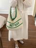 Bolsa de Palha Tecida para Mulheres 2025 Verão Novo Estilo Design Vazado para Brincadeiras na Praia e Roupas de Trabalho Bolsa de Ombro/Axila de Tricô