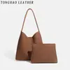 Bolsa de palha tecida vintage de grande capacidade para mulheres, nova bolsa de ombro versátil de outono 2026, versão coreana bolsa de balde simples para o dia a dia