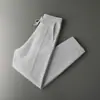 Pantalones gruesos de cachemira para hombre, pantalones versátiles de corte ajustado, prenda exterior cálida con bolsillos, pantalones de lana, pantalones de punto de invierno