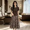 Conjunto de moda para mujer 2026 verano nuevo estilo elegante ropa para madre de mediana edad camiseta de manga corta falda estampada conjunto de dos piezas