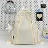 Mochila de estilo casual y simple para hombres y mujeres, gran capacidad, mochila de viaje ligera, mochila escolar elegante, nuevo modelo 2026, versátil