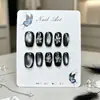 Uñas press-on cortas cuadradas-redondas estilo ojo de gato negras con accesorios florales plateados hechos a mano, geniales y elegantes, piezas de arte de uñas terminadas desmontables