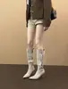 Botas longas de salto alto retrô da moda estilo coreano 2026, saltos agulha, bico fino, fecho de botão, botas de cowboy western conversíveis