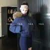 Nueva chaqueta de plumón corta de invierno para mujer con capucha y cuello grande de pelo, abrigo de algodón versátil para mujeres petite