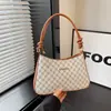 Bolsa de ombro retrô minimalista, design de nicho, bolsa casual nova, bolsa de axila feminina tendência verão 2026