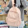 Nova mochila escolar para meninas, mochila com bordado de coração, grande capacidade, alto apelo estético, adequada para alunos do ensino fundamental, médio e médio