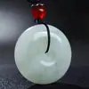 Venta al por mayor de fábrica Jade de Tianshan de Xinjiang seguro sin importar la marca colgante de oro Colgante de rosca de jade seguro hebilla para hombres y mujeres