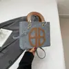 Bolsa Grande Capacidade para o Trabalho para Mulheres 2025 Novo Estilo Casual Elegante Bolsa de Ombro com Cores Contrastantes Design Coreano de Nicho Bolsa Tote