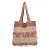 Estilo casual y relajado, bolsa de mano tejida a rayas con borlas, bolso de hombro tejido vintage de color contrastante con borde deshilachado, bolso de mano para estudiante