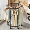 Tendedero móvil para balcones con poleas giratorias, caracterizado por un diseño de empujar y tirar y un marco hexagonal engrosado
