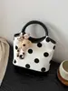 Bolso de Lunares para Mujer 2026 Nueva Moda de Verano Tendencia Bolso Cubo de Hombro Cruzado Único para el Trabajo y los Viajes