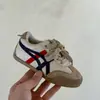 Tênis Qqo Kidsren 2025 Outono Novo Tênis Color Block Qqo Kidsren em Couro Genuíno para Homens e Mulheres, Crianças de Meia-Idade e Grandes Tênis Casuais da Moda Qqo Kidsren Forrest Gump