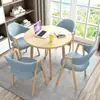 Conjunto de mesa e cadeiras para negociação loja comercial recepção reunião mesa redonda pequena área de descanso simples casual uma mesa quatro cadeiras mesa de jantar