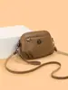 Bolsa de mão de alta qualidade, estilosa e transfronteiriça para mulheres de meia-idade, nova coleção 2026, design retrô e minimalista, bolsa de ombro, bolsa transversal e porta-celular