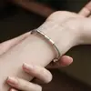 Pulseira de bambu estilo chinês retrô retrô feminina nicho prata tailandesa simples moda torção criativa aberta pulseira atacado