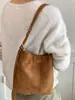 Bolso tipo cubo minimalista estilo coreano Shuai Mi Jia, nuevo modelo otoño 2026, bolso de hombro de alto valor estético, bolso de hombro único y moderno