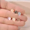 Pendientes Youmo Doudou para Mujer Primavera 2026 Nuevos Pendientes de Resina Venta al por Mayor Dulce Fresco Nicho Estilo de Alta Gama