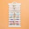 Pulsera tejida de aleación de gran venta transfronteriza con cuentas de aceite de gota de diamante y ojo de diablo, estilo europeo y americano, 12 pulseras simples.