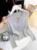 Suéter tejido hueco de cuello en V con temperamento estilo Little Chanel para mujer, diseño de otoño e invierno, ajuste ceñido, versátil, reduce la edad, capa base 14682