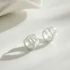Zirconia nueva moda personalidad lujo ligero nicho hebilla de oreja pendientes de moda todo partido geométrico