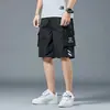 Llegada Nueva 2021 Pantalones Cortos para Hombre Verano Marca de Moda Sueltos de Cinco Puntos Ropa Exterior Pantalones Capri Overoles Casuales Pantalones Deportivos para Hombre