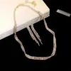 Set de dos piezas de aretes y collar de encaje con incrustaciones de diamantes, totalmente incrustado de diamantes, exquisitamente elaborado, cadena para la clavícula con un diseño único, joyería de nicho para mujer, venta al por mayor