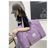 Nueva bolsa de almacenamiento para maternidad de gran capacidad para guardar edredones, conveniente para viajar, se puede acoplar a una maleta de ruedas para viajes de negocios y de placer.