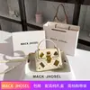 Entrega de una sola pieza súper popular bolsa cuadrada pequeña portátil de rombos 2023 caja de insignia estilo Chanel de alta calidad al por mayor