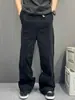 Nuevos Pantalones Rectos Negros Tendencia Americana Primavera/Verano 2026 para Hombre con Dobladillo Crudo Lateral Pantalones Largos Casuales Versátiles de Largo Completo