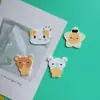 Nuevos accesorios acrílicos de Rilakkuma sosteniendo estrellas al por mayor para manualidades con pegamento de crema, zuecos y materiales para cables de datos