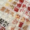 Accesorios para Uñas Mini Lazo de 12 Rejillas Tamaños Mixtos Color Café Rojo Lazo Flotante Rhinestones de Resina para Uñas Venta al por Mayor