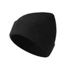 Gorro de punto transfronterizo más vendido para mujer, gorro cálido de invierno para ciclismo con protección para las orejas, gorro de punto a prueba de viento de lana para hombre, al por mayor en stock