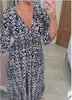 Novo Vestido Feminino Super Fada Decote V Floral 2024 Vestido de Praia para Férias na Beira-Mar Vestido Longo Solto com Estampa Digital