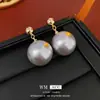 Pendientes de Perla con Aguja de Plata Galvanizada en Oro Real Pendientes Simples Versátiles Elegantes Nicho Lujo Ligero Pendientes de Gama Alta Fabricante